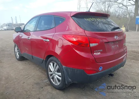 2012 Hyundai Tucson Limited z USA, uszkodzony, nr VIN KM8JUCAC0CU404461